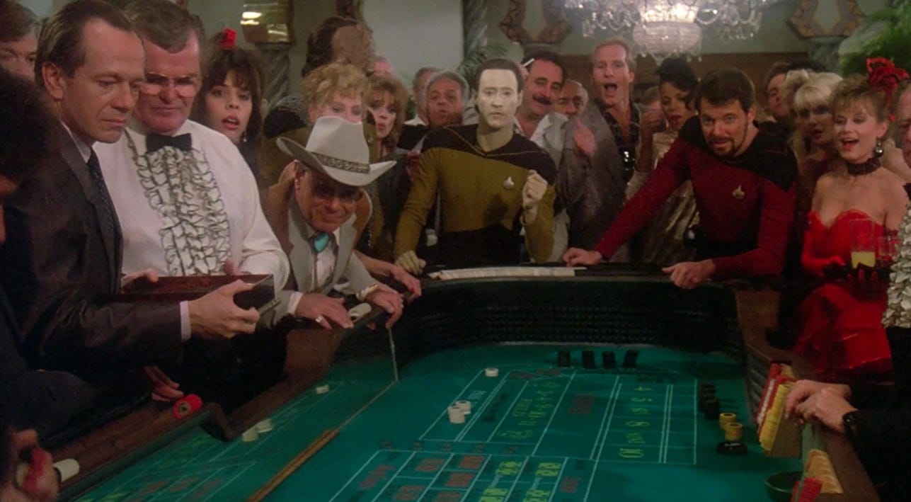 Data rolls the craps table at a traditional American casino in an episode of Star Trek: TNG
