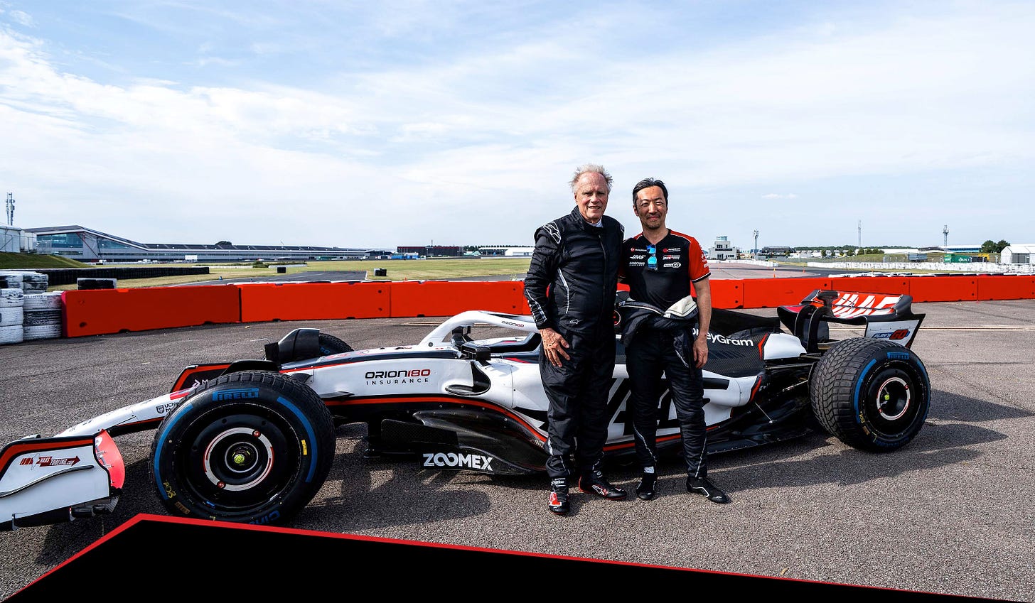 Gene Haas with Ayao Komatsu and the 2023 VF-23.