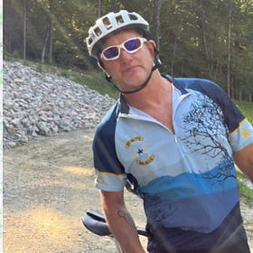 Internet sleuths identify cyclist who set fire to Trump signs at Raleigh home