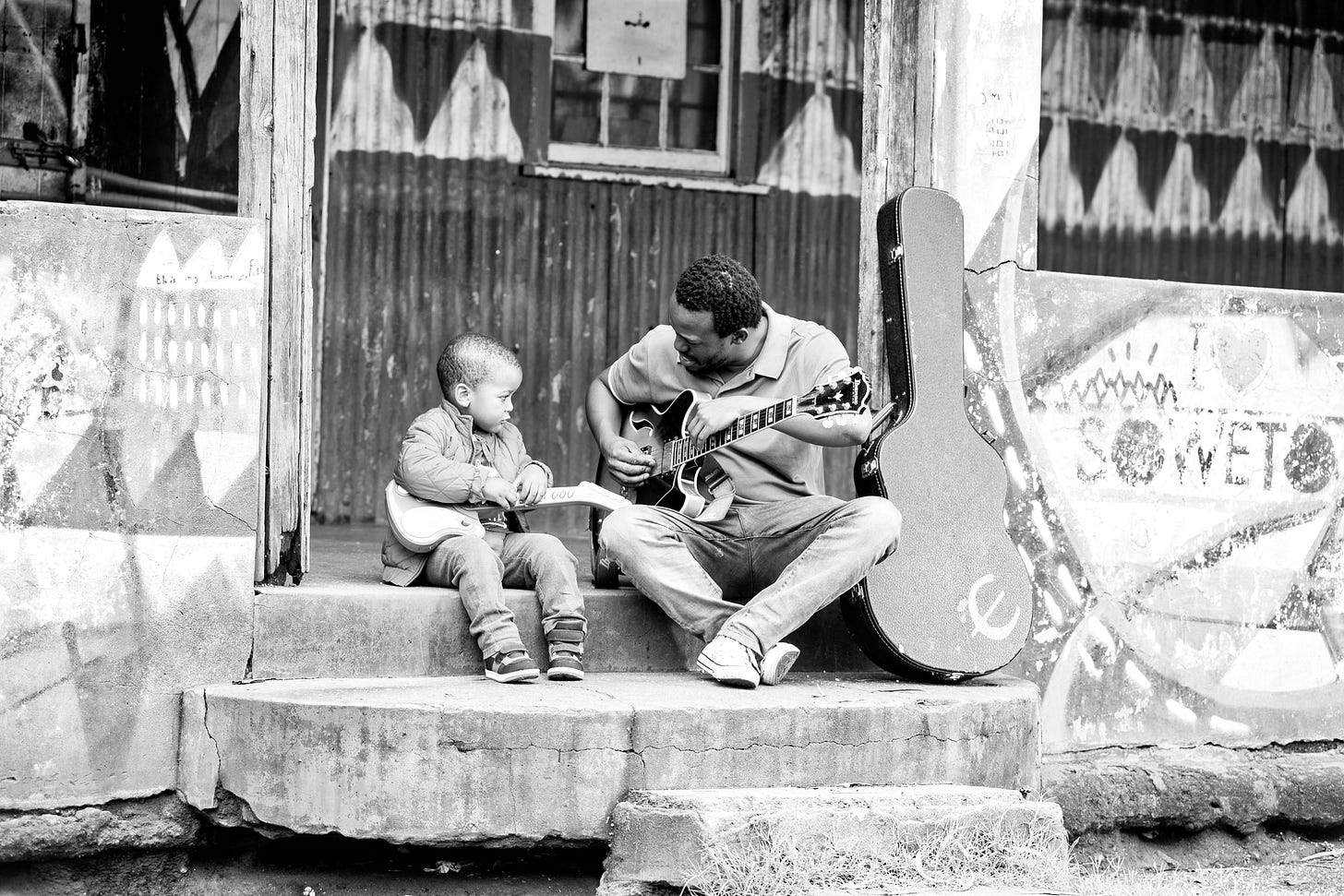 File:Father & Son Sharing Music Skills.jpg - Wikimedia Commons