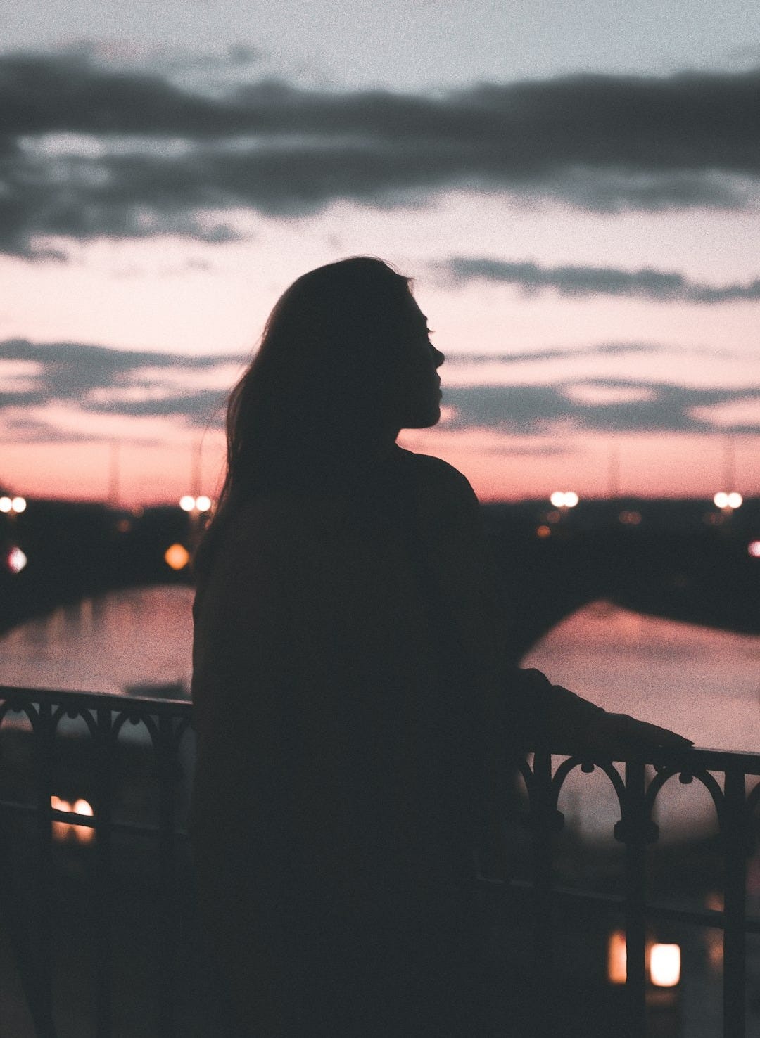 a person standing on a balcony