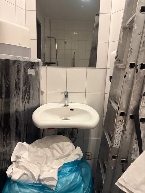 A potbury of accessible toilet photos with chairs, ladders, parasols and clutter 
