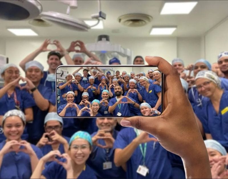 NHS staff together smiling for the camera