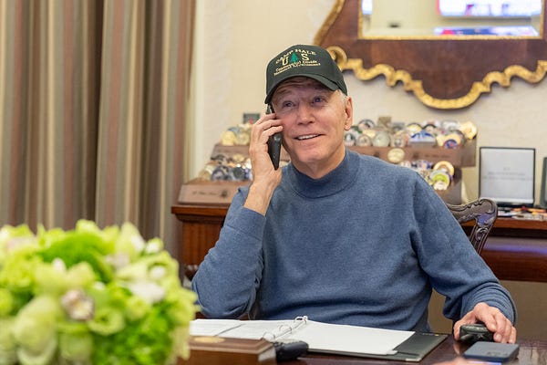 President Biden speaks on the phone.