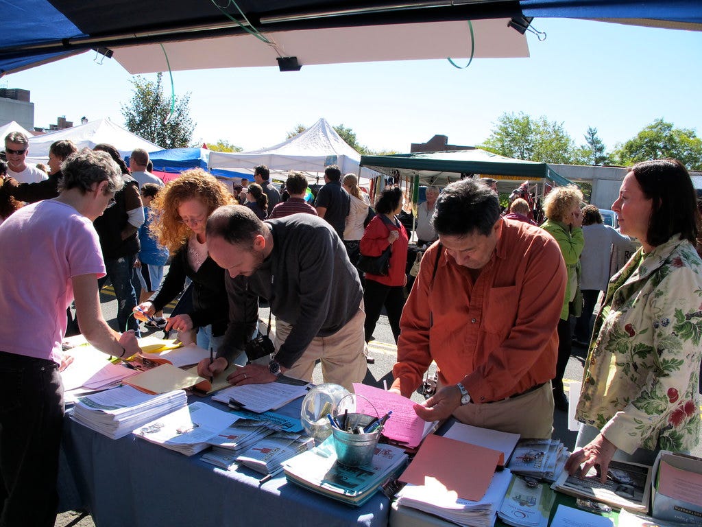Nyack, NY - 350.org climate change educational table, petition signing and letter writing at Nyack Street Fair. Photo by Laurie Peek Nyack, NY - 350.org climate change educational table, petition signing and letter writing at Nyack Street Fair. Photo by Laurie Peek