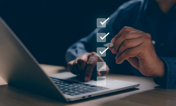 Businessman using pen and laptop online check survey filling out, digital form checklist satisfaction questionnaire and feedback report result of voting client. Business performance monitoring concept Businessman using pen and laptop online check survey filling out, digital form checklist satisfaction questionnaire and feedback report result of voting client. Business performance monitoring concept quality issue stock pictures, royalty-free photos & images