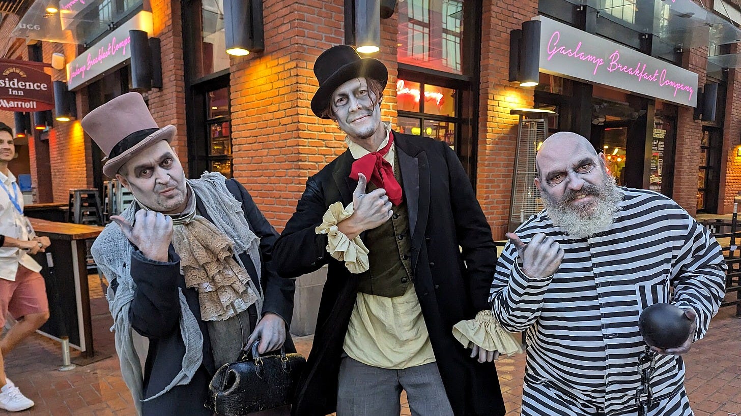 Cosplayers dressed as Haunted Mansion's Hitchhiking Ghosts at Comic-Con in 2023. Image: Cory Doctorow via Wikimedia Commons Cosplayers dressed as Haunted Mansion's Hitchhiking Ghosts at Comic-Con in 2023. Image: Cory Doctorow via Wikimedia Commons