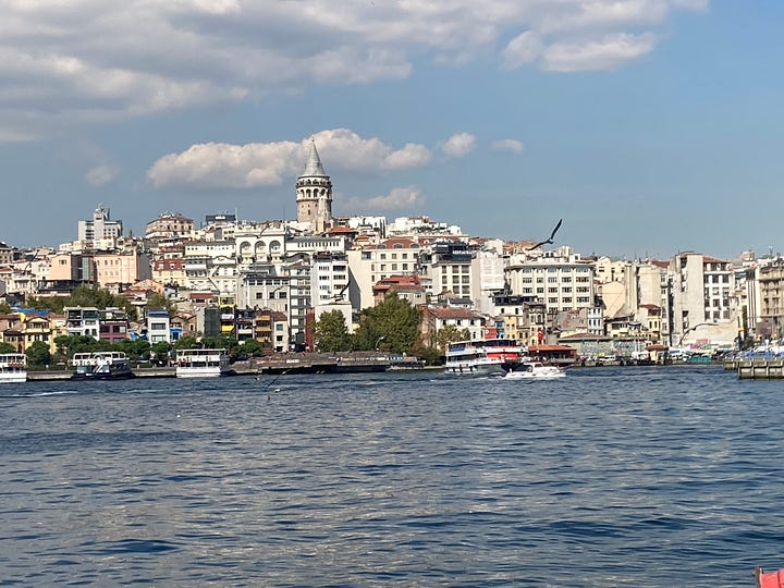 View of Galata from across the Golden Horn, and rainbow over the Bosphorus