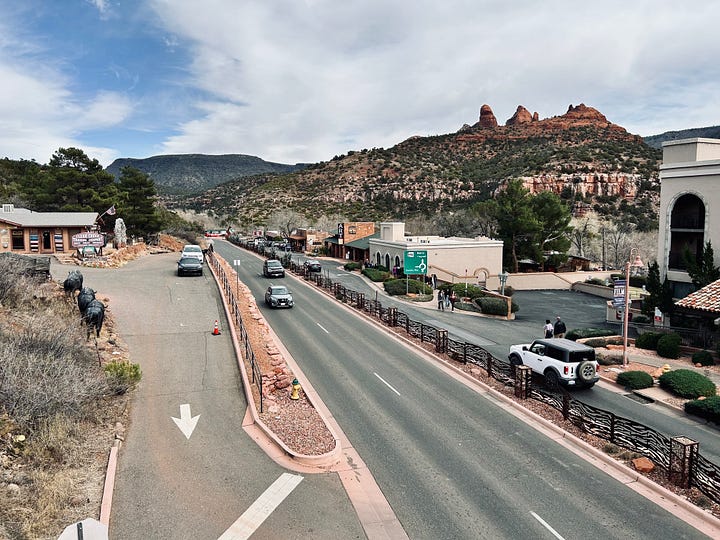mountains, street, rocks, cars, people, walkway