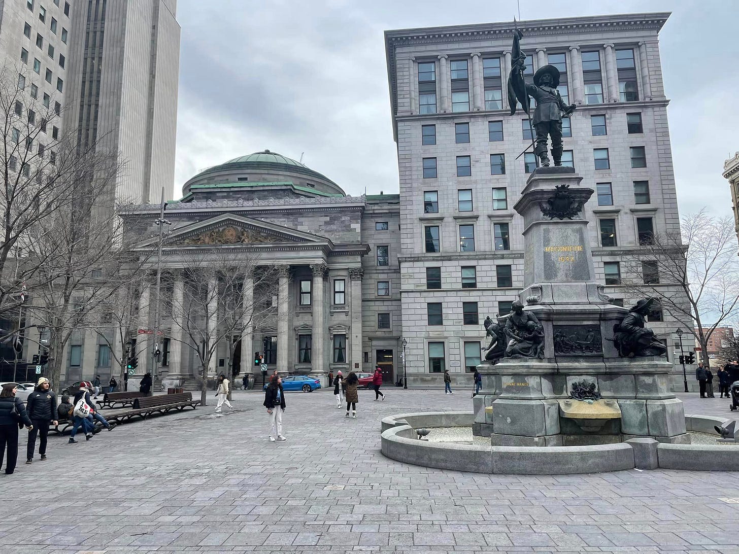 May be an image of 12 people, outdoors and monument