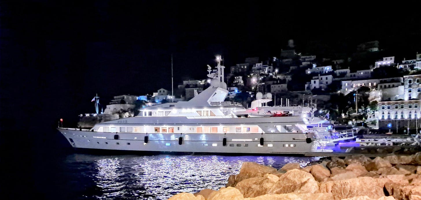 Mega-Yacht in Hydra’s harbor at night