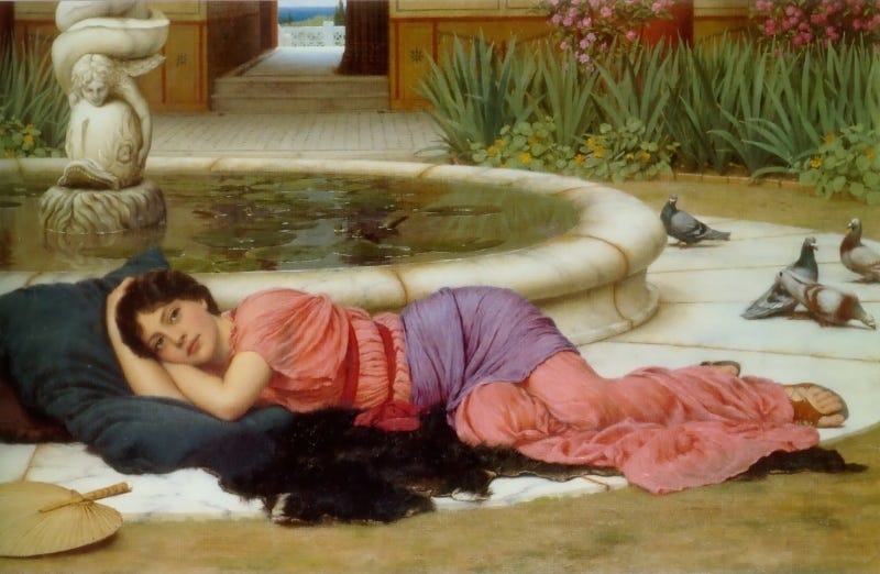 A Cool Retreat by John William Godward, 1910. Pre-Raphaelite style painting of a young woman reclining next to a fountain. The woman has dark brown hair and is wearing a pink Greek-style chiton with a red sash wrapped around the waist and ribcage as well as a lavender drape wrapped around her hips. She is lying on large cushions and an animal skin on the marble paving around a circular fountain that contains water and lily pads. Several pigeons wander nearby, and a palm-frond fan lies near her.