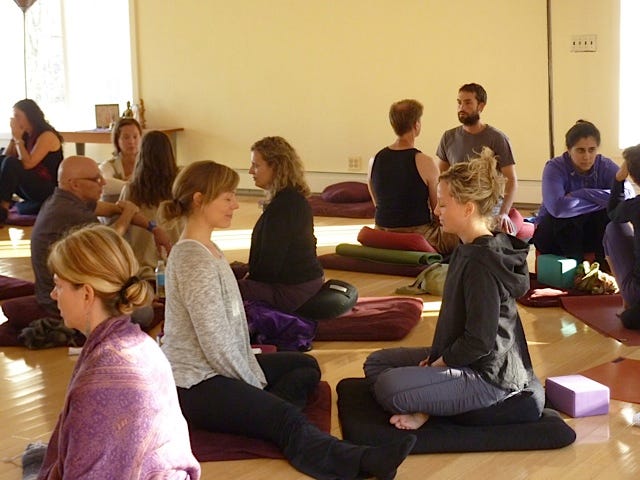 Group of people practicing Insight Dialogue in dyads Group of people practicing Insight Dialogue in dyads