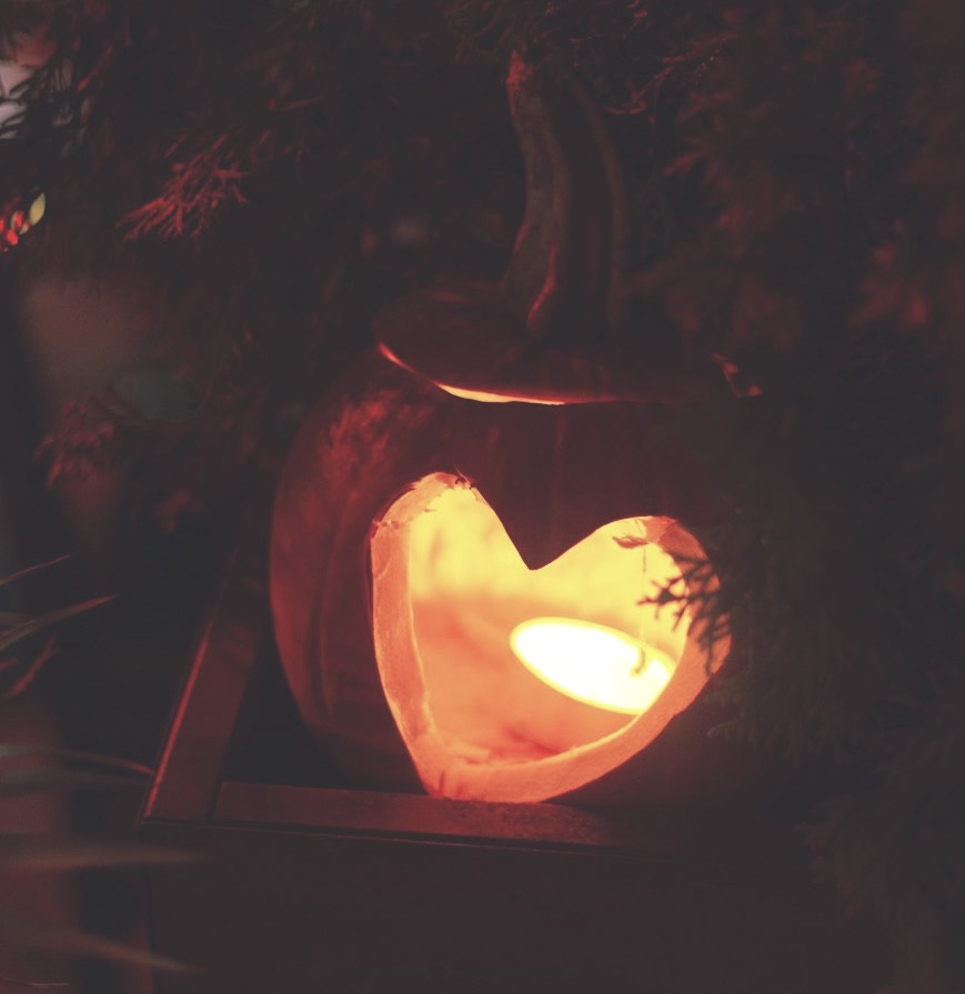 a pumpkin carved to look like a heart a pumpkin carved to look like a heart