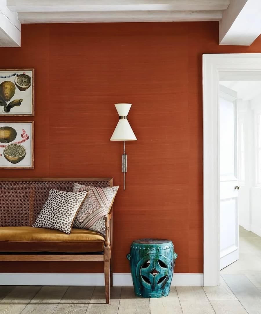 silk wall covering in a paprika orange tone in a living room silk wall covering in a paprika orange tone in a living room