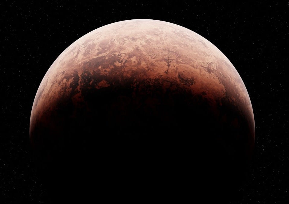 A close up of a red moon in the sky
