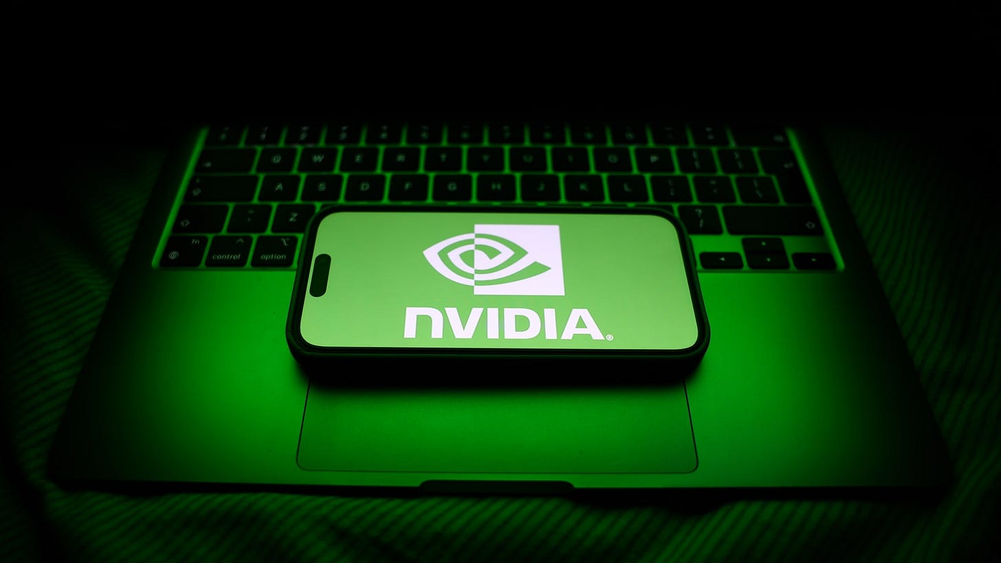 A laptop keyboard and Nvidia logo displayed on a phone screen are seen in this illustration photo taken in Krakow, Poland on March 28, 2025. 