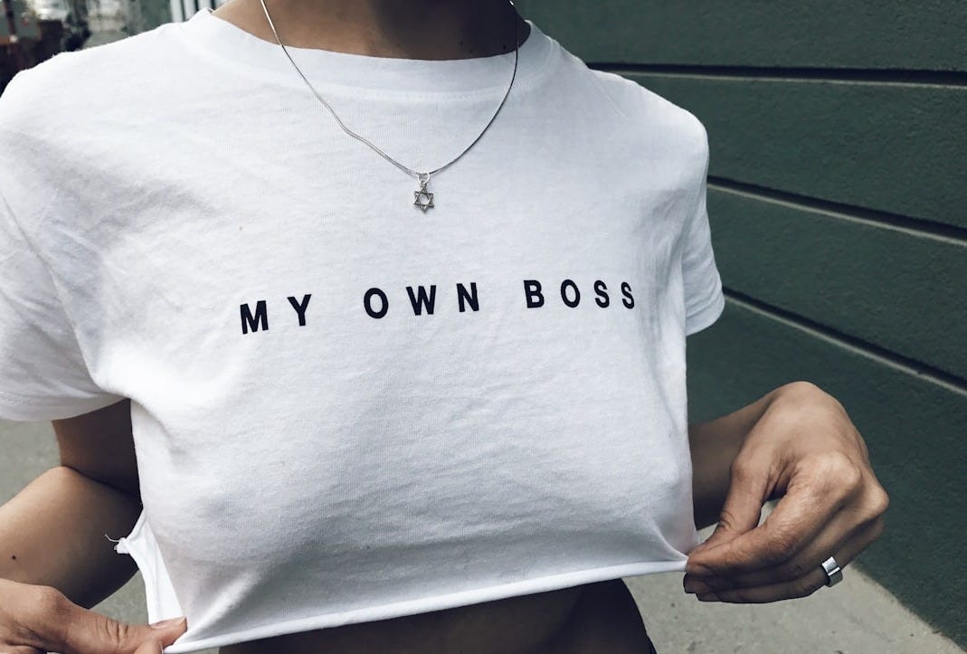 woman wearing white My own Boss printed crop shirt woman wearing white My own Boss printed crop shirt