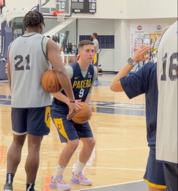 T.J. McConnell shoots free throws after practice.