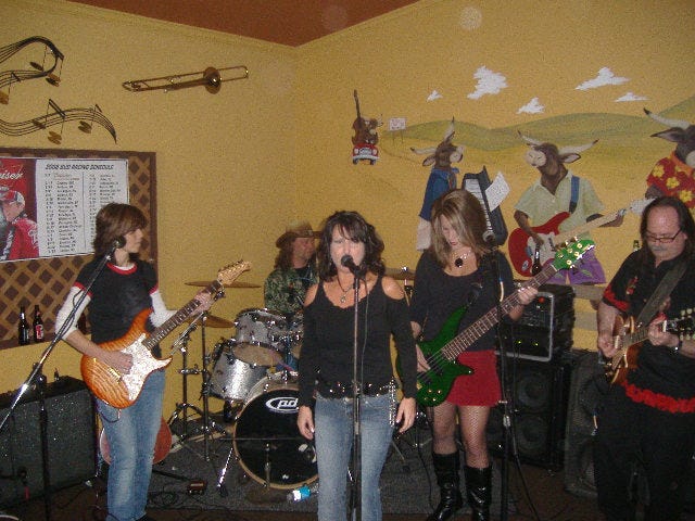 Speaking of girls, that provides a nice segue to Agent 99. These three ladies and two guys tore through a half-dozen classic rockers. They get the gratuitous shots you'll see next.