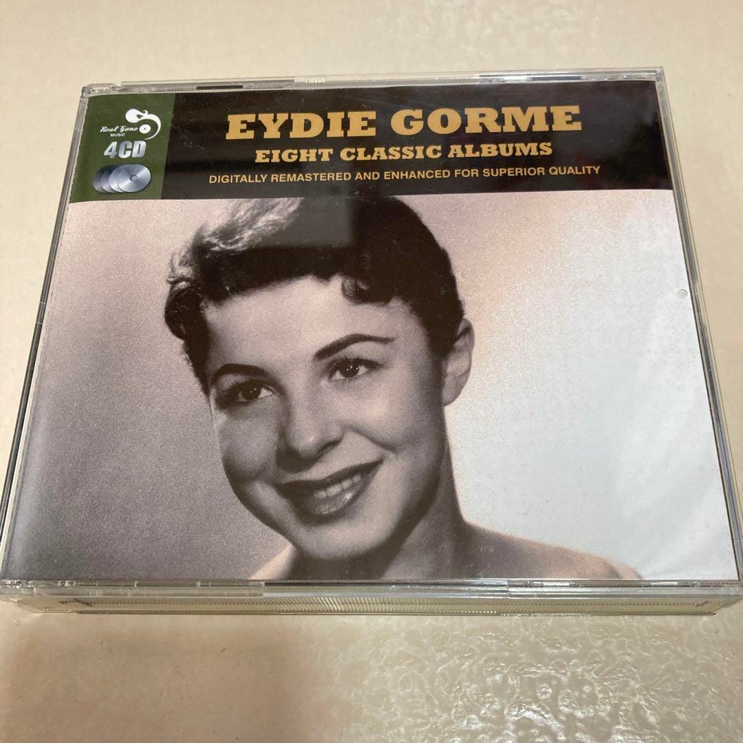 A cd case with a person's face on it

AI-generated content may be incorrect.