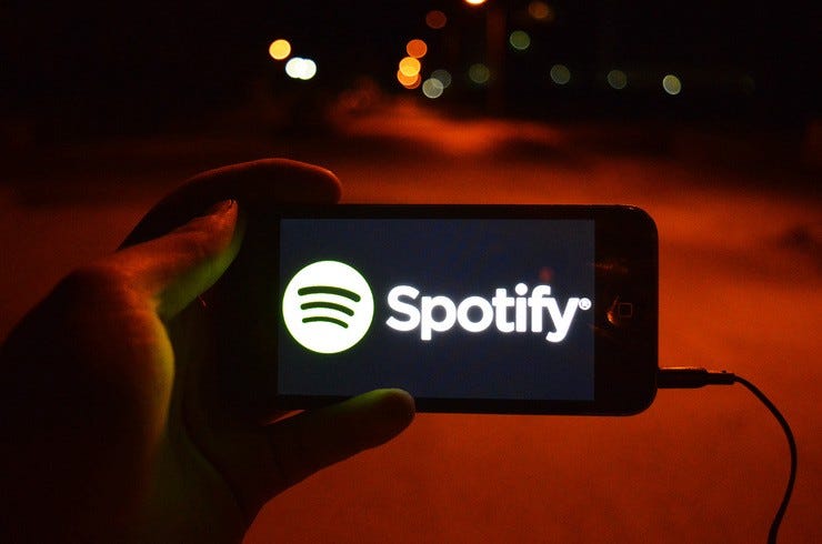 Spotify logo phone 2017 billboard 1548