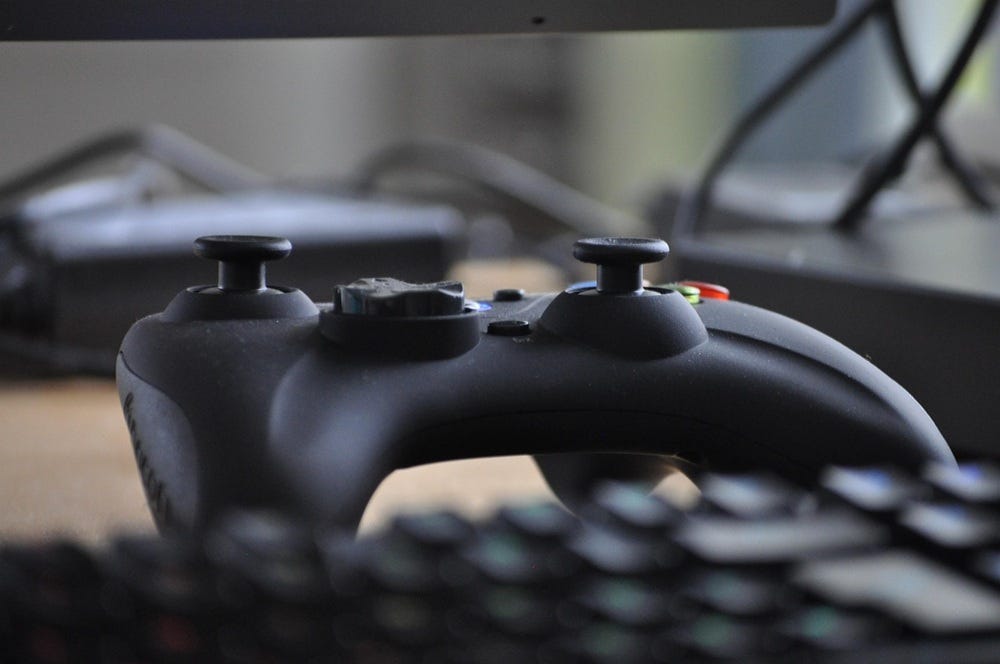 image depicts a close up of a video game controller.