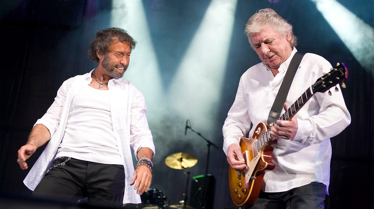 BIRMINGHAM, UNITED KINGDOM - APRIL 01: Mick Ralphs and Paul Rodgers (R) of Bad Company perform on stage at LG Arena on April 1, 2010 in Birmingham, England. BIRMINGHAM, UNITED KINGDOM - APRIL 01: Mick Ralphs and Paul Rodgers (R) of Bad Company perform on stage at LG Arena on April 1, 2010 in Birmingham, England.