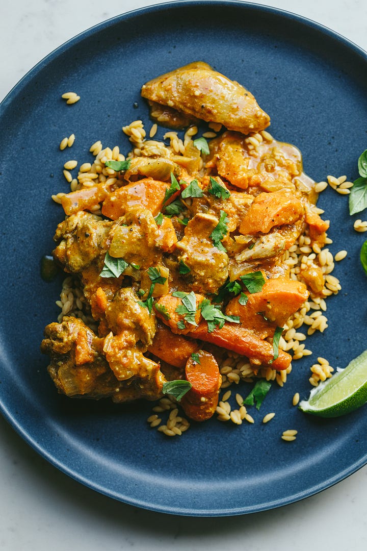 Thai red curry in the crockpot and on a serving plate.