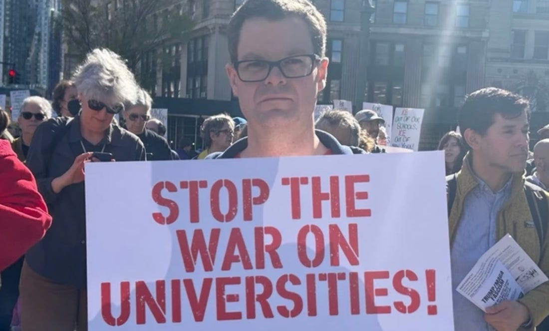 A person holding a sign

AI-generated content may be incorrect.
