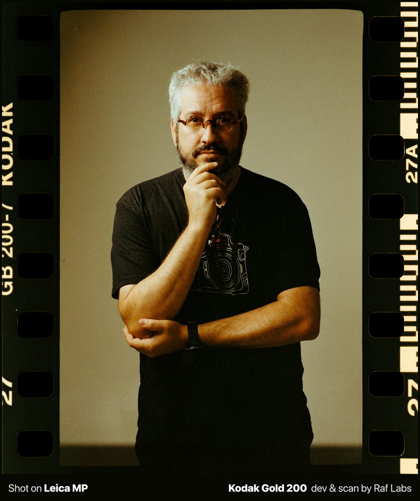 Studio photo of Raf, with good lighting, and film photography Studio photo of Raf, with good lighting, and film photography