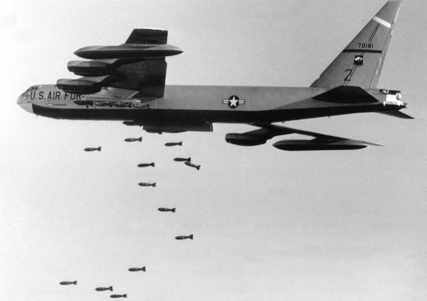 A Strategic Air Command B-52 bomber, laden with 750-pound bombs, on a bombing run towards a target northwest of Saigon near Tay Ninh, November 2, 1965, showcasing early aerial might. A Strategic Air Command B-52 bomber, laden with 750-pound bombs, on a bombing run towards a target northwest of Saigon near Tay Ninh, November 2, 1965, showcasing early aerial might.