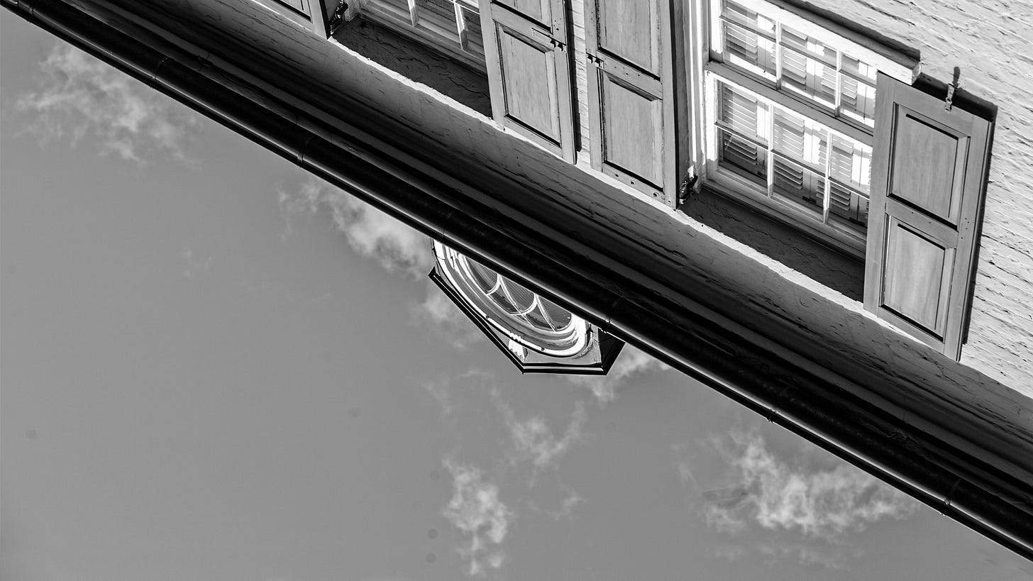 A building stretches to the sky below