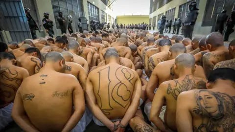 Reuters Gang members wait to be taken to their cells after 2000 gang members were transferred to the Terrorism Confinement Center Reuters Gang members wait to be taken to their cells after 2000 gang members were transferred to the Terrorism Confinement Center