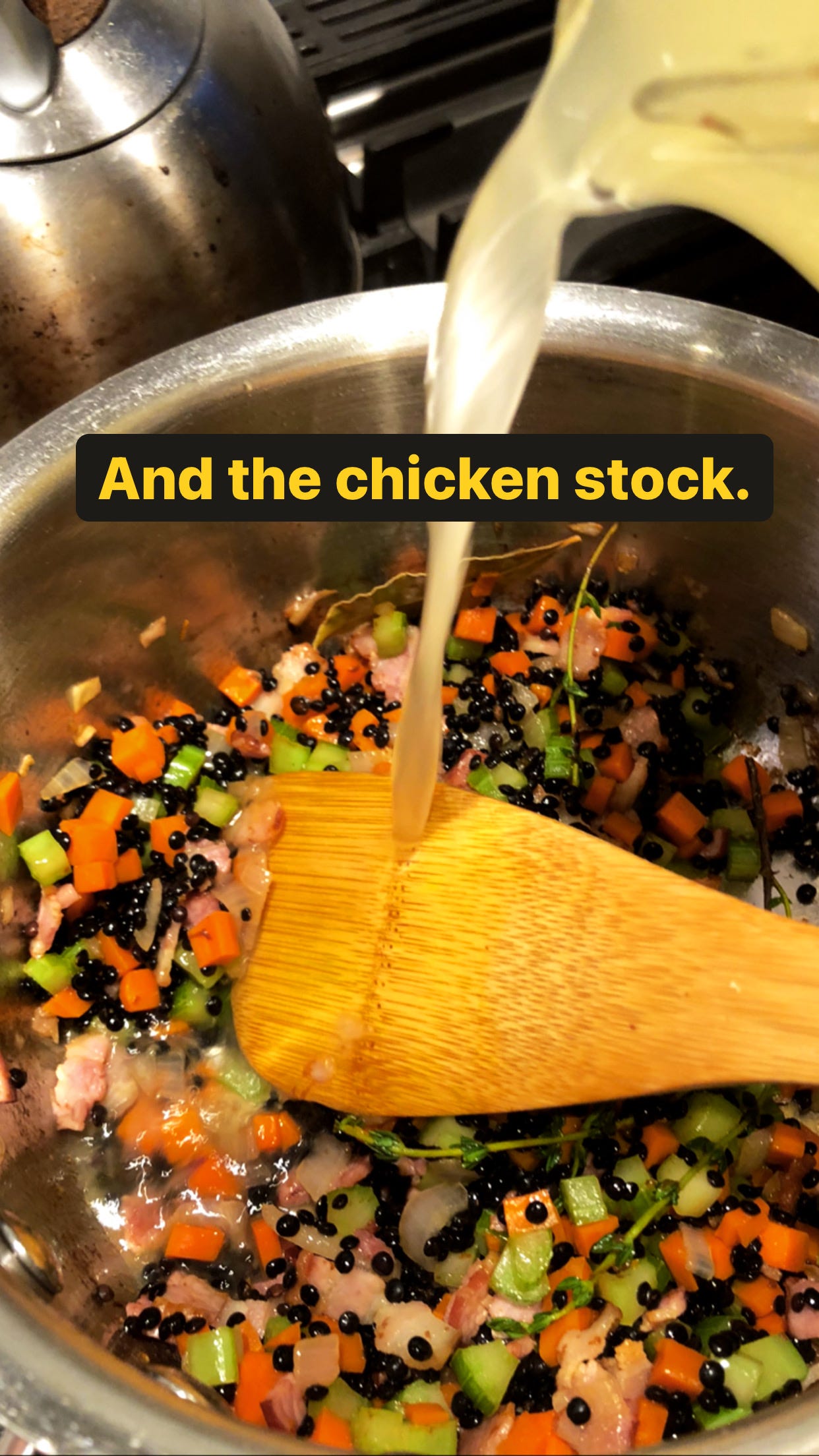 Chicken stock added to the pot
