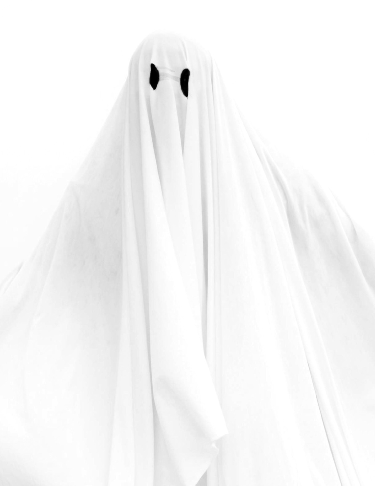 Person in a classic bedsheet ghost costume.