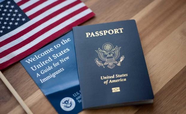 A close-up of a passport and a flag

AI-generated content may be incorrect.
