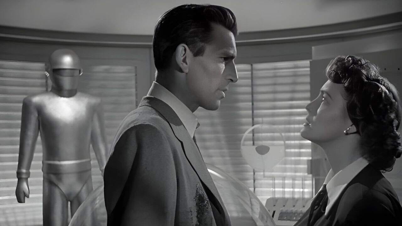 Michael Rennie and Patricia Neal in a pivotal scene in the sci-fi masterpiece The Day the Earth Stood Still (1951). Michael Rennie and Patricia Neal in a pivotal scene in the sci-fi masterpiece The Day the Earth Stood Still (1951).