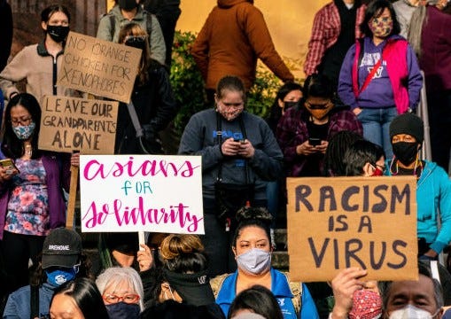 Demonstrators gather for a rally and march against anti-Asian hate and bias in Seattle, Washington Demonstrators gather for a rally and march against anti-Asian hate and bias in Seattle, Washington