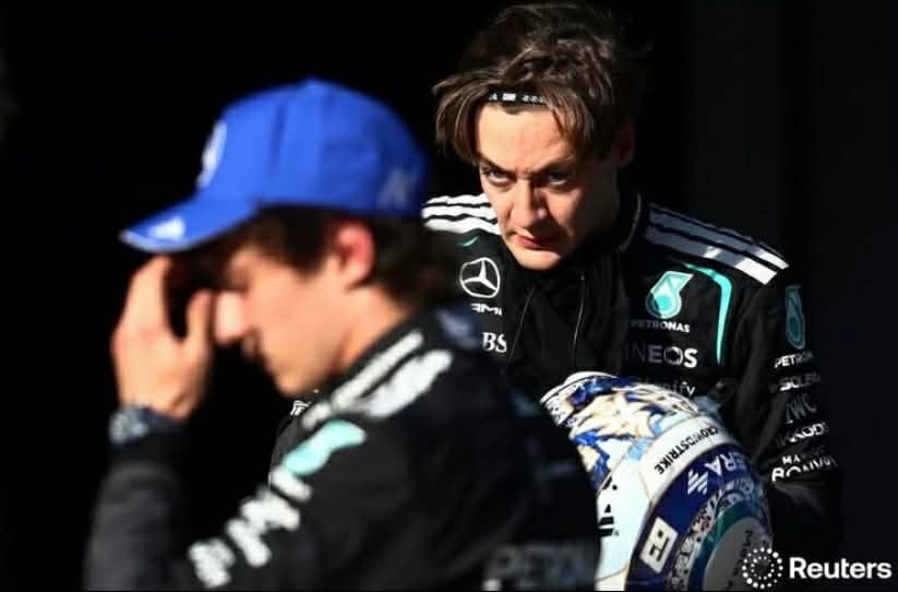 May be an image of racing vehicles, helmet and text May be an image of racing vehicles, helmet and text