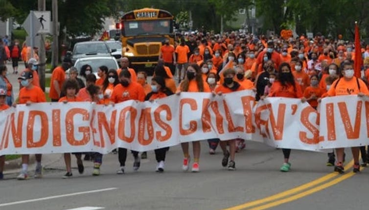 Standing Up To The Orange Shirts