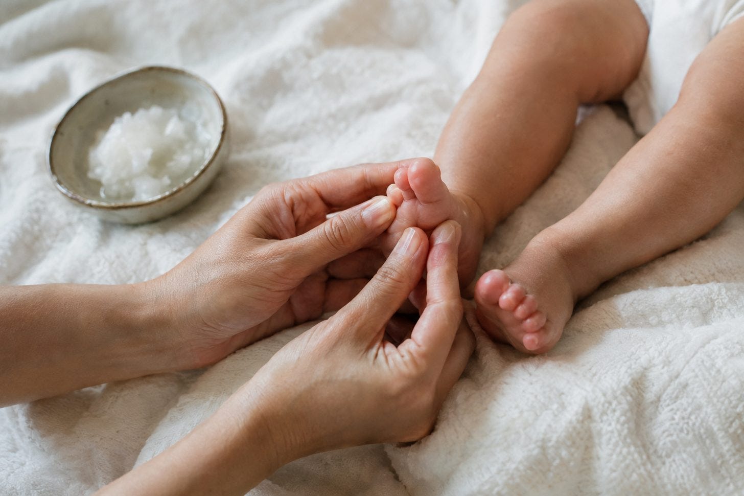 Infant oil massage is an ancient tradition across India and the tropics.
