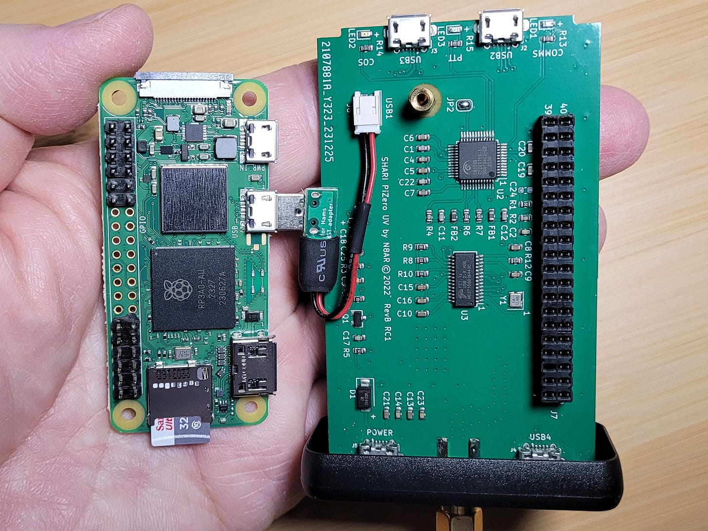 The microSD card is on the underside of the Raspberry Pi board