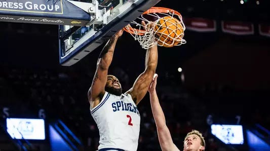 Jaden Daughtry slams home a dunk vs Southern Virginia