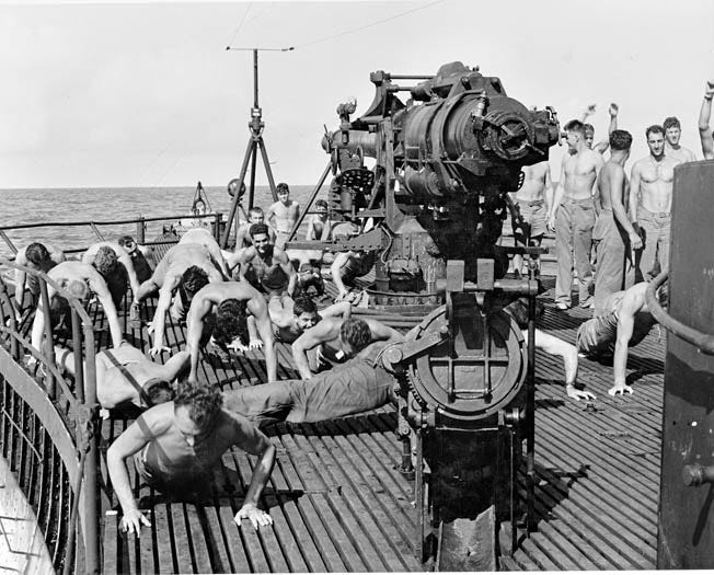 ABOVE: The arduous march across Guadalcanal took Carlson’s Raiders through heavy jungle vegetation and across treacherous terrain. Disease, particularly malaria, was rampant among both American and Japanese troops on the island, which the Japanese finally abandoned in February 1943. OPPOSITE: Captain Martin Clemens, perhaps the best known of the Australian coastwatchers in the Solomon Islands during the early months of the war in the Pacific, poses with several of his native scouts. ABOVE: The arduous march across Guadalcanal took Carlson’s Raiders through heavy jungle vegetation and across treacherous terrain. Disease, particularly malaria, was rampant among both American and Japanese troops on the island, which the Japanese finally abandoned in February 1943. OPPOSITE: Captain Martin Clemens, perhaps the best known of the Australian coastwatchers in the Solomon Islands during the early months of the war in the Pacific, poses with several of his native scouts.