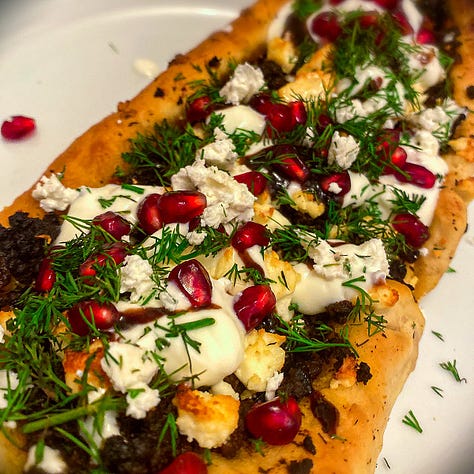A selection of reasonable food photos, one risotto with tomatoes on a white plate, onei of roasted asparagus and oozing cheese on a white plate, cheese selection on a slate and