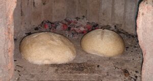 Bread in beehive oven Bread in beehive oven