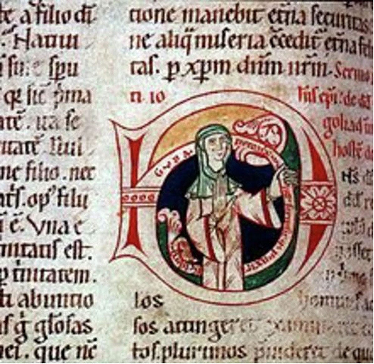 A section of a page from a Medieval manuscript, featuring an image of a woman inside a large decorative letter among the regular text