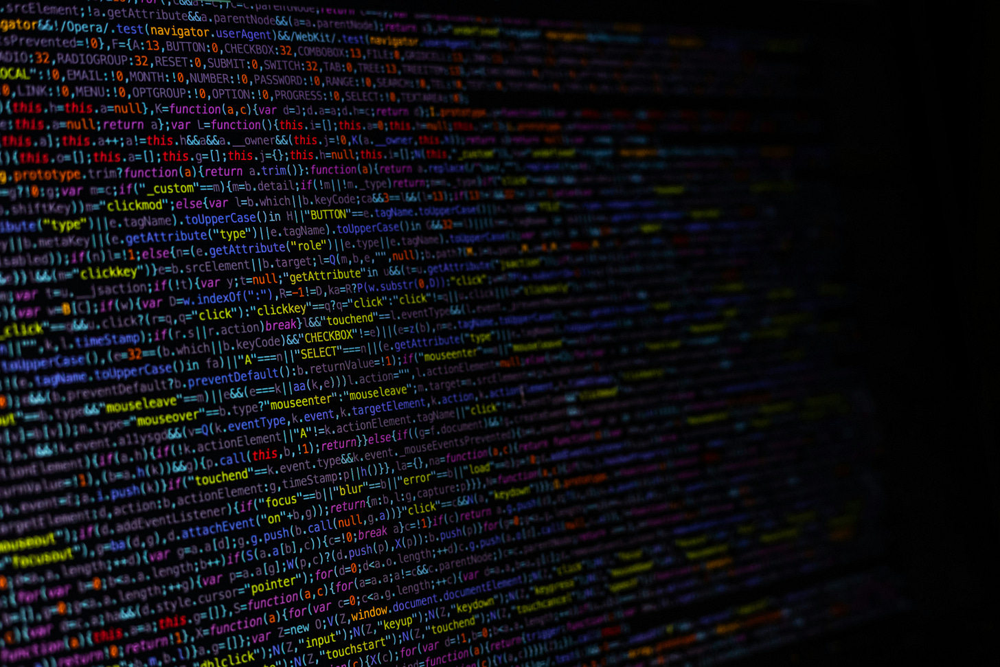 A wall of overlapping code snippets from multiple programming languages. Layers blur into each other, evoking complexity, entropy, and legacy systems under strain.
