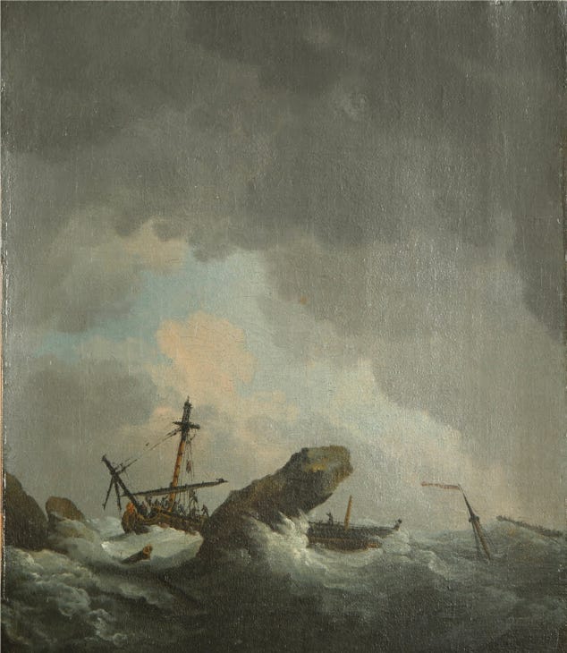 Shipwreck on rocks with crashing waves